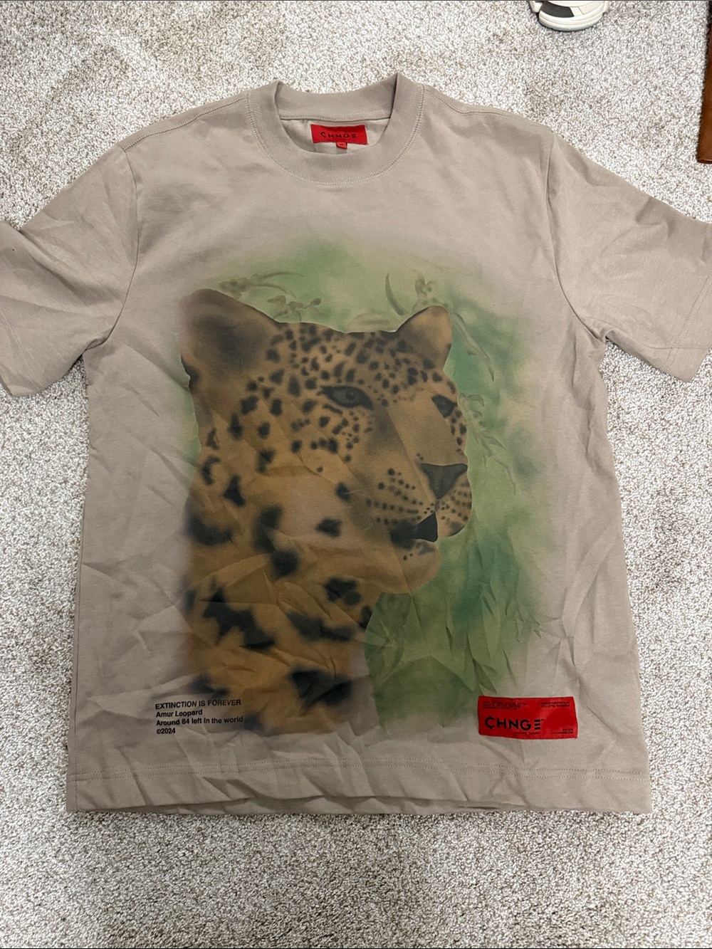 CHNGE Beige Tee with Leopard Portrait and Green Accents